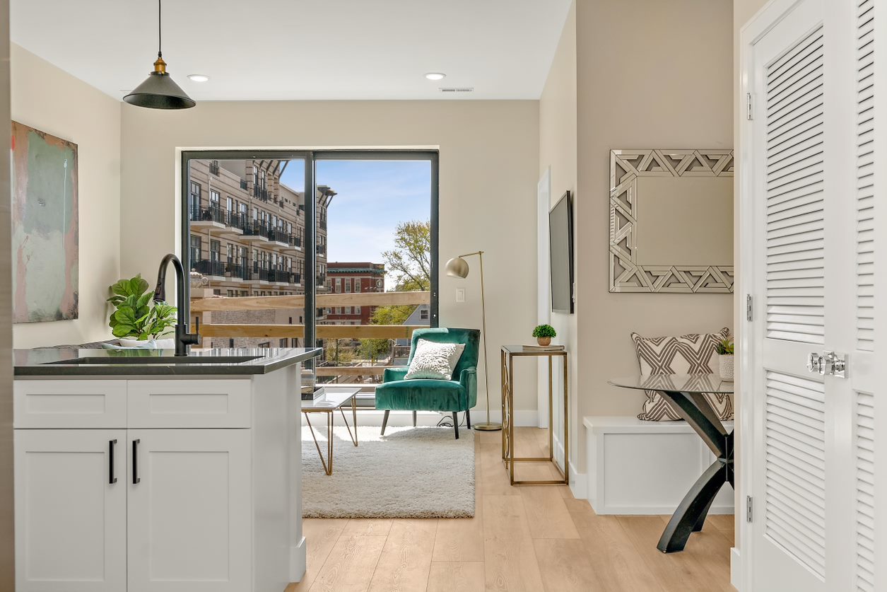 Undisclosed Address Chicago, IL 60657 - Photo 8 of 22 a bedroom with furniture and a window