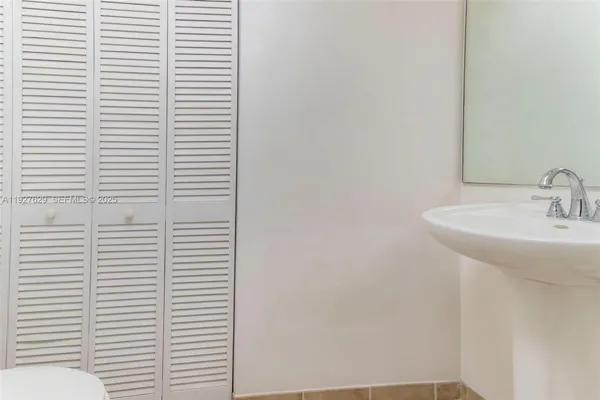 a bathroom with a sink and a toilet