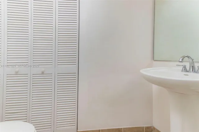 a bathroom with a sink and a toilet