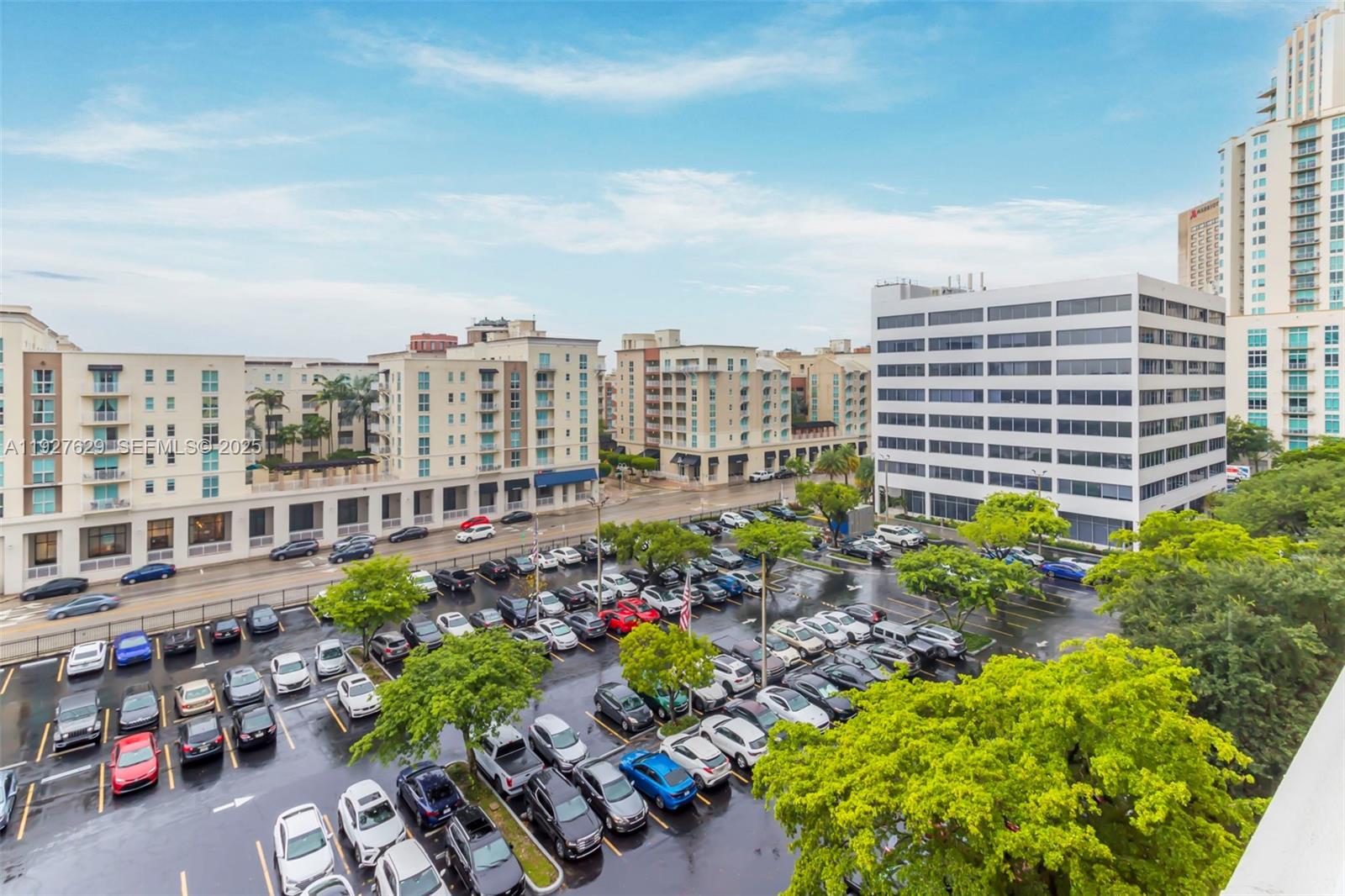 7355 Southwest 89th Street, Unit 721N Miami, FL 33156 - Photo 17 of 29 a city view with tall buildings