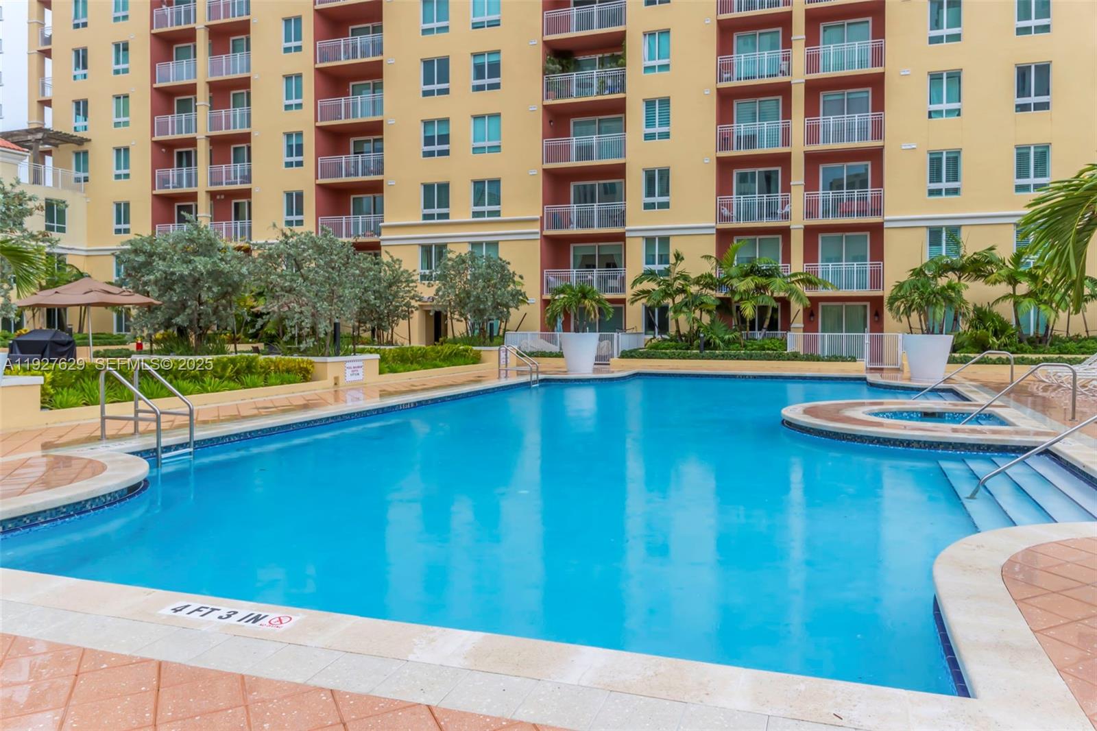 7355 Southwest 89th Street, Unit 721N Miami, FL 33156 - Photo 24 of 29 a view of a swimming pool with outdoor seating