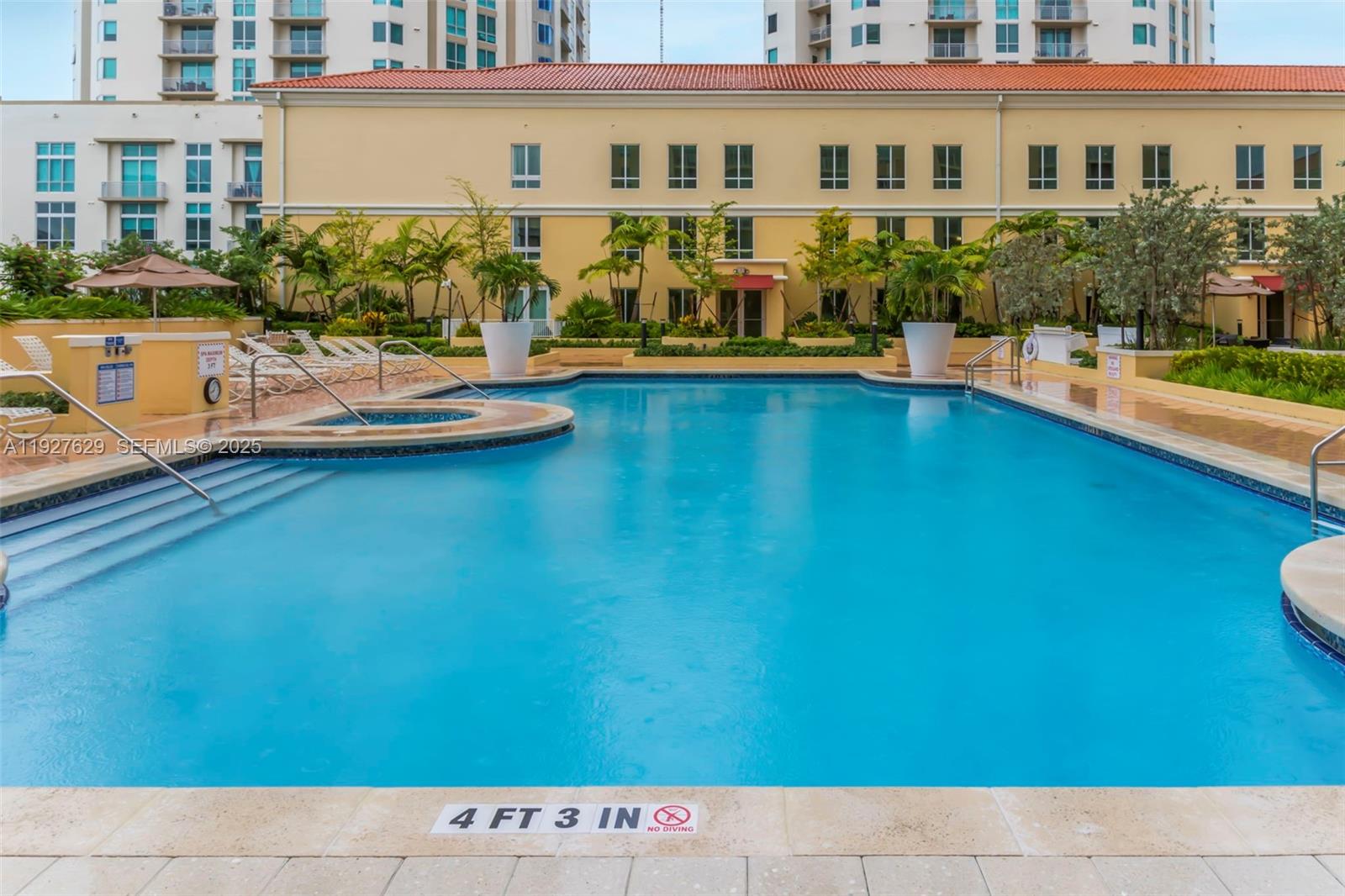 7355 Southwest 89th Street, Unit 721N Miami, FL 33156 - Photo 27 of 29 a view of a swimming pool with outdoor seating