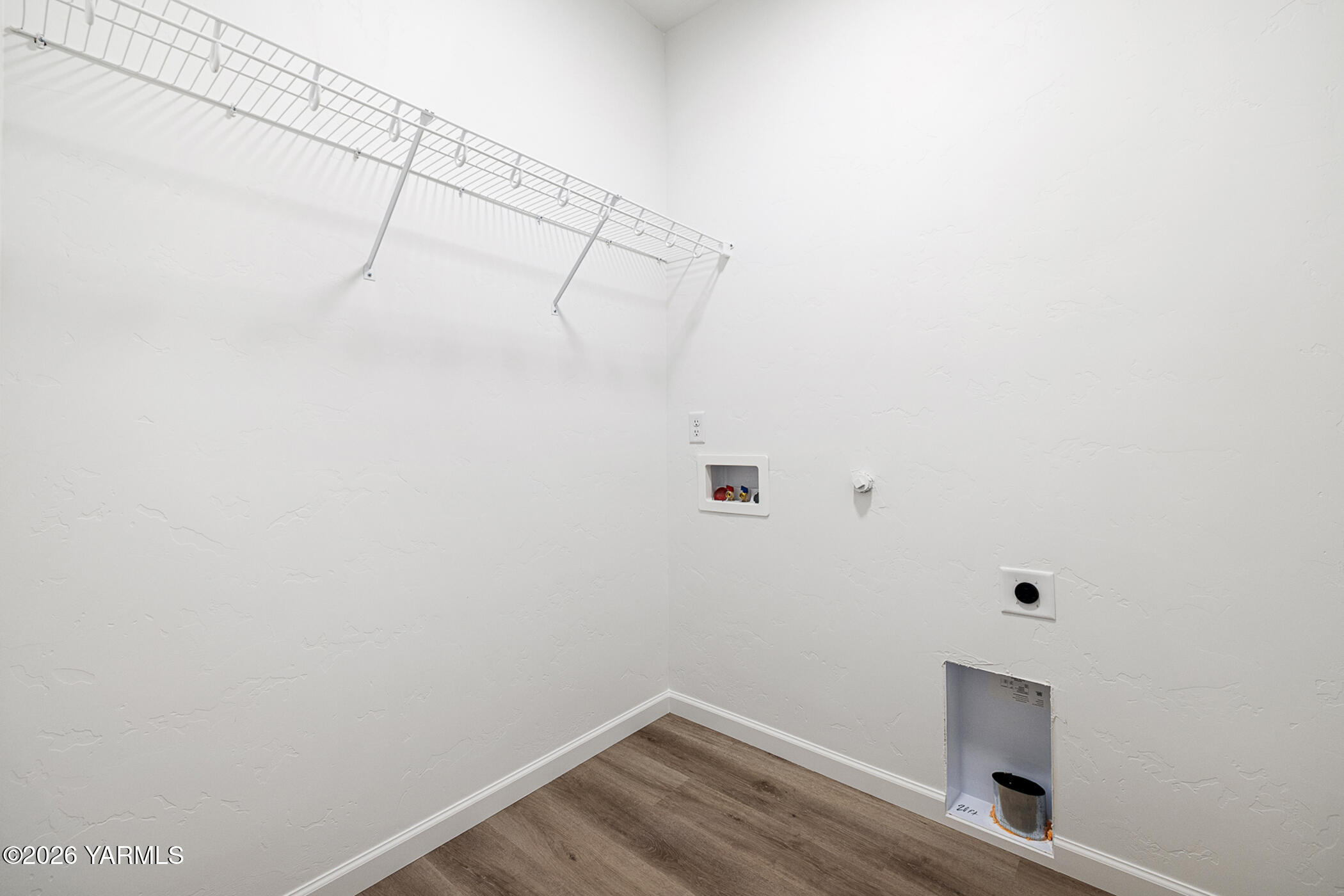 1603 Diamond Avenue Grandview, WA 98930 - Photo 12 of 32 a view of a room with racks on the wall