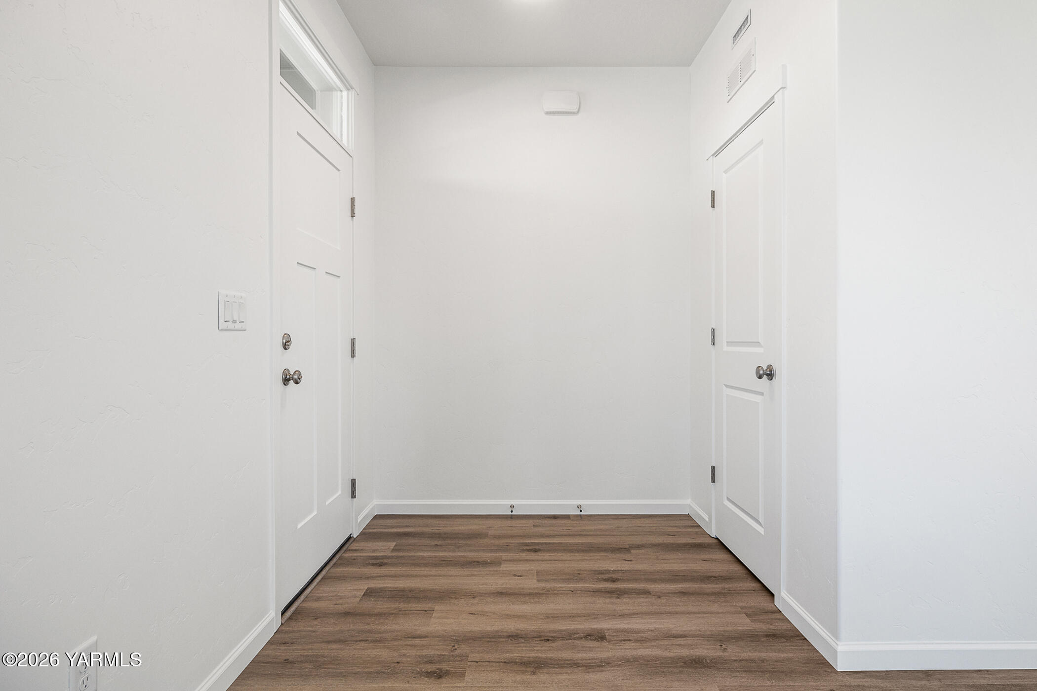 1603 Diamond Avenue Grandview, WA 98930 - Photo 2 of 32 a view of a room with wooden floor