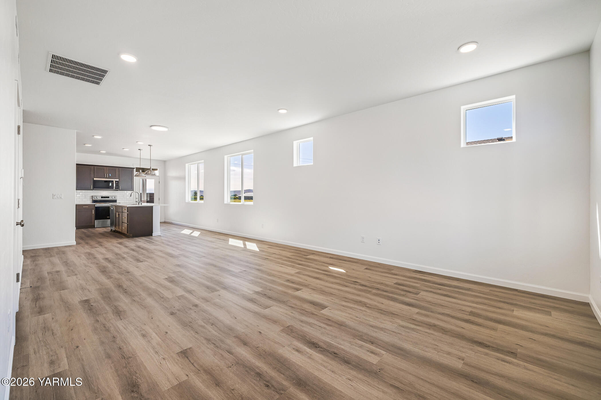 1603 Diamond Avenue Grandview, WA 98930 - Photo 3 of 32 a view of kitchen with furniture and wooden floor