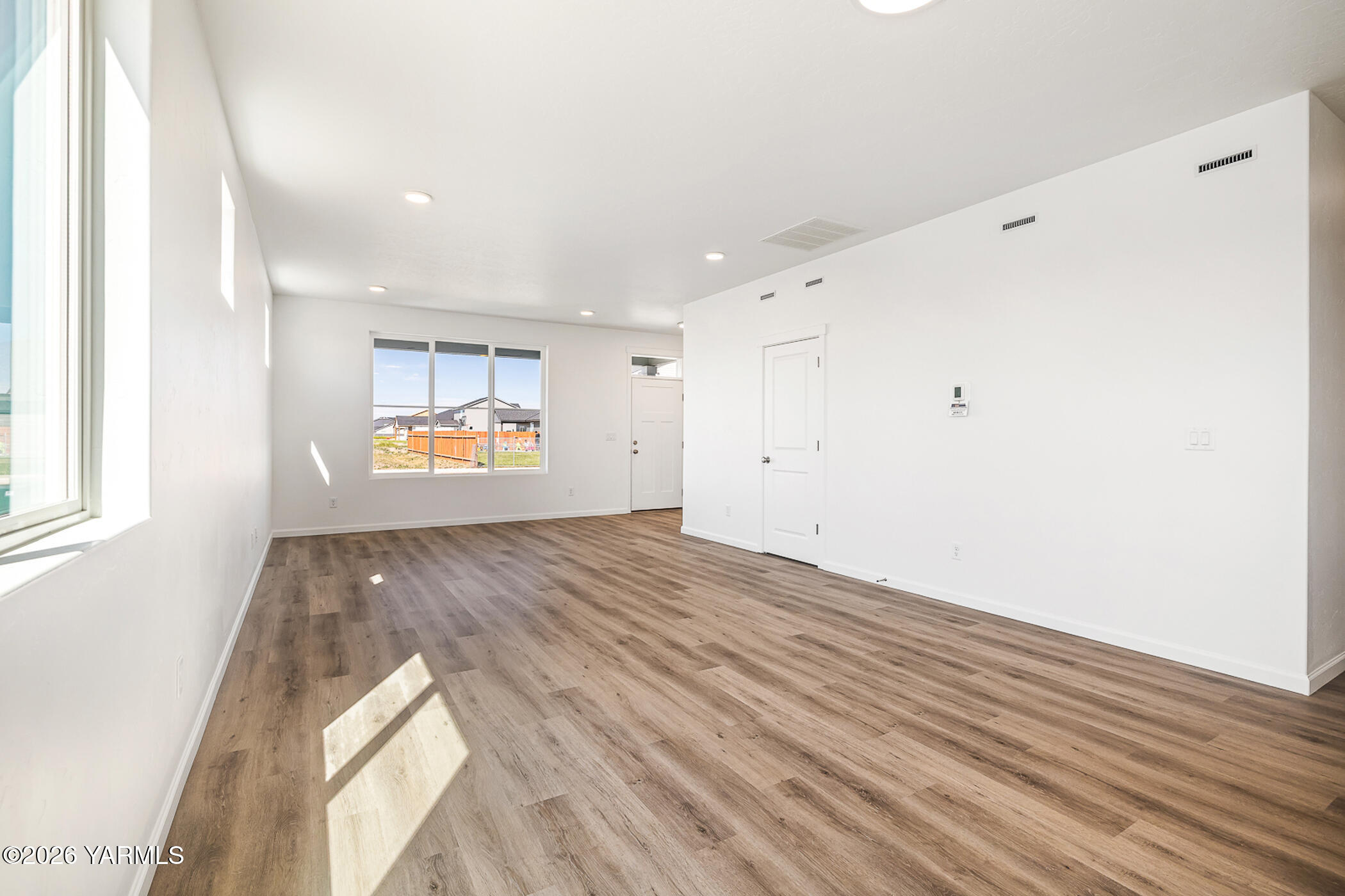 1603 Diamond Avenue Grandview, WA 98930 - Photo 5 of 32 a view of a room with window and wooden floor