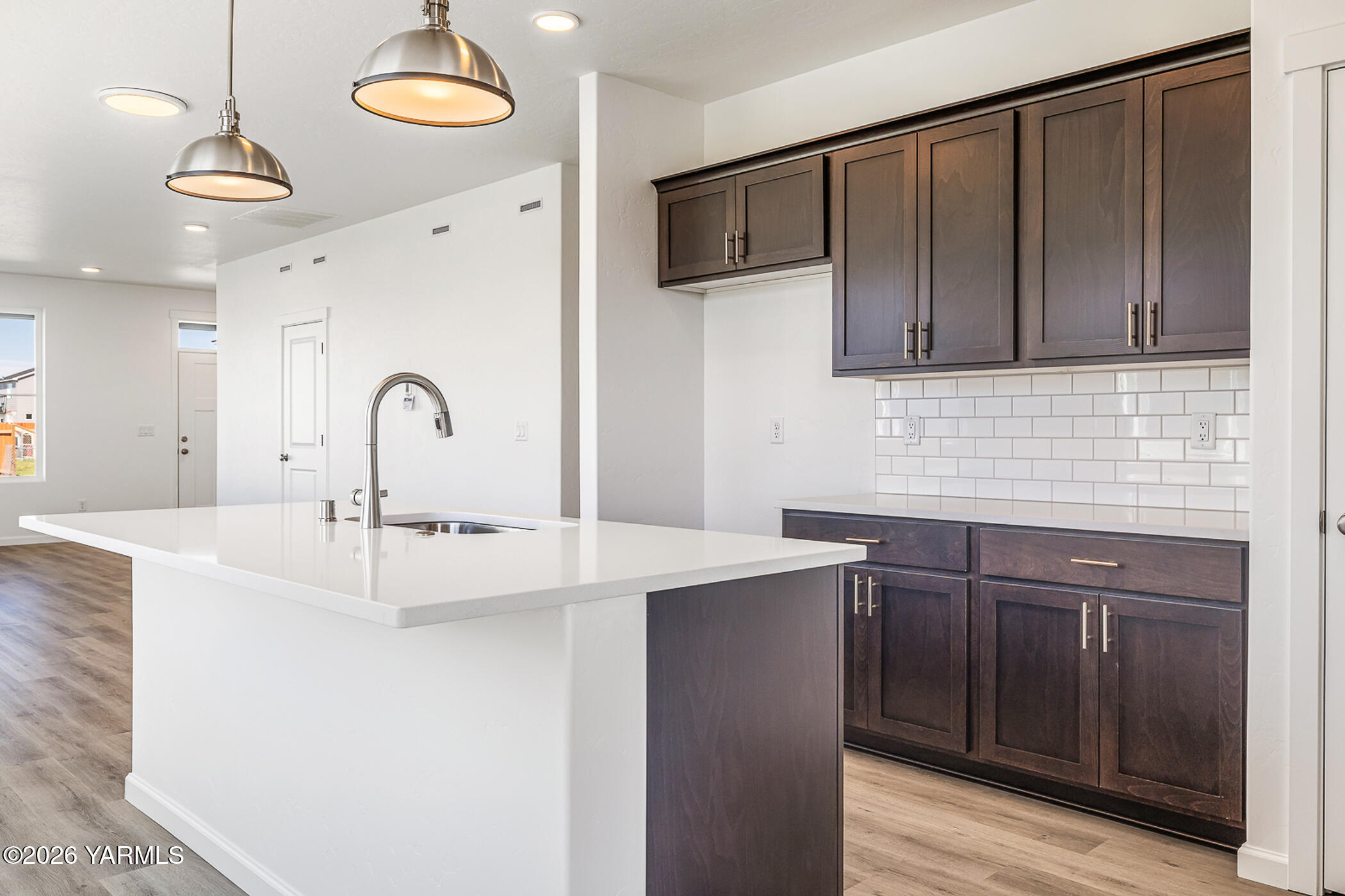 1603 Diamond Avenue Grandview, WA 98930 - Photo 9 of 32 a kitchen with a sink and cabinets