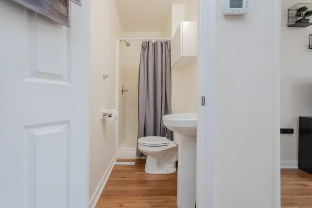 a bathroom with a toilet and a sink
