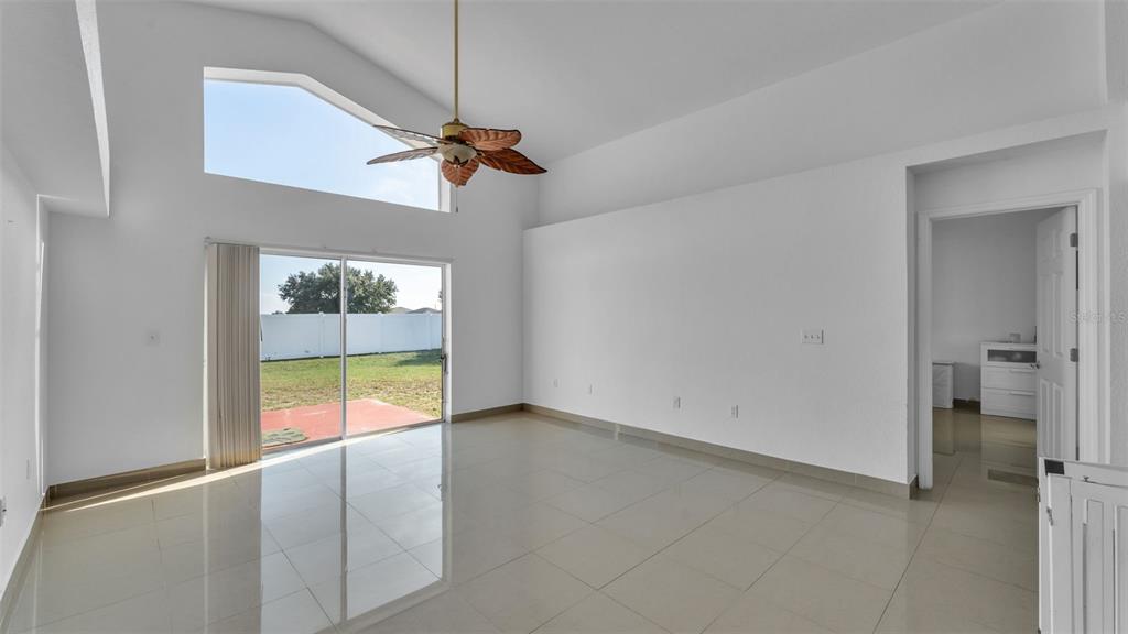 587 Drayton Road Winter Haven, FL 33884 - Photo 19 of 40 a view of an empty room and a window