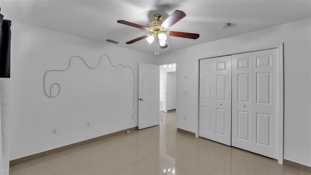 587 Drayton Road Winter Haven, FL 33884 - Photo 22 of 40 wooden floor in an empty room