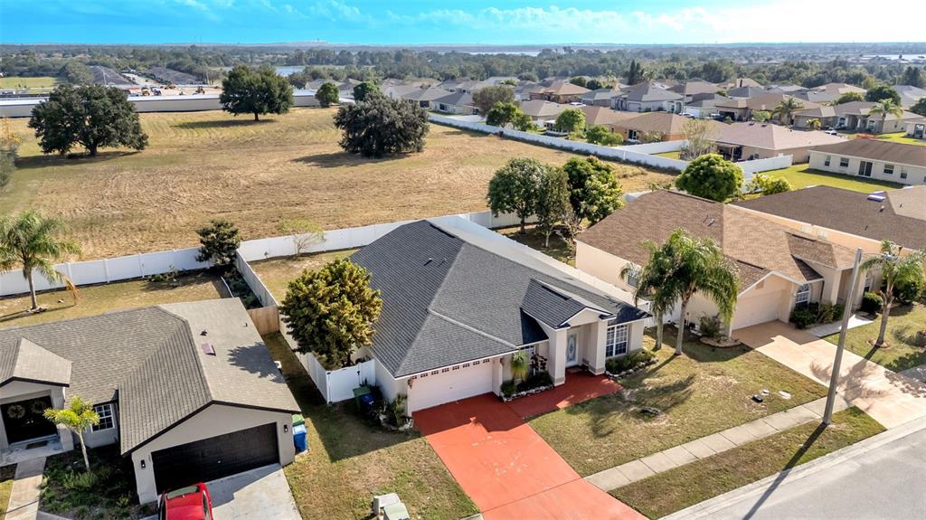 587 Drayton Road Winter Haven, FL 33884 - Photo 37 of 40 an aerial view of residential houses with outdoor space