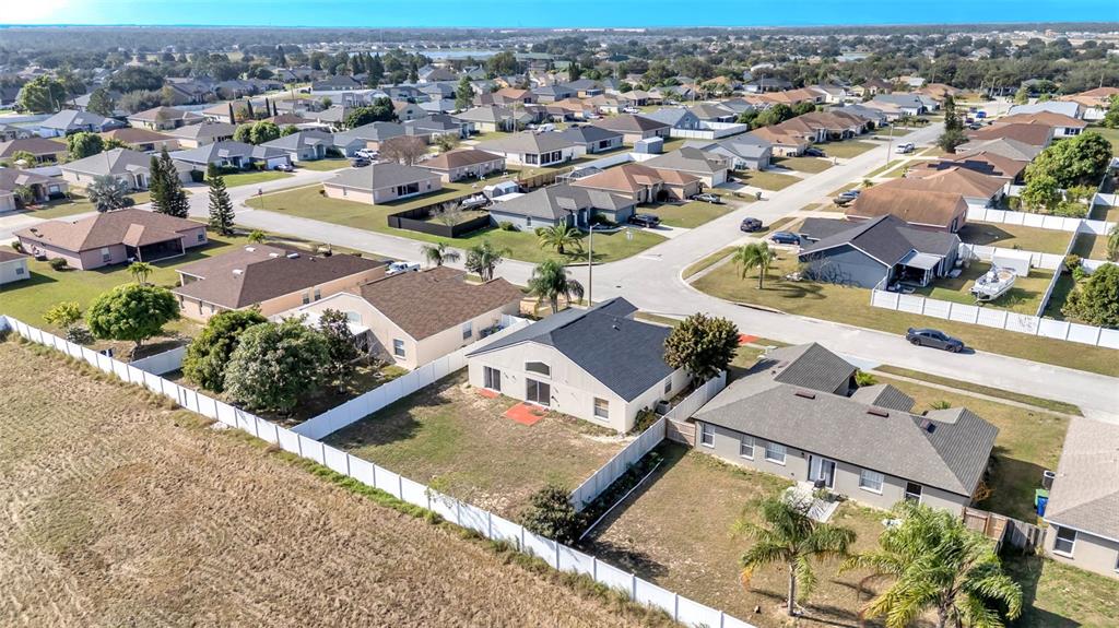 587 Drayton Road Winter Haven, FL 33884 - Photo 39 of 40 an aerial view of residential houses with outdoor space