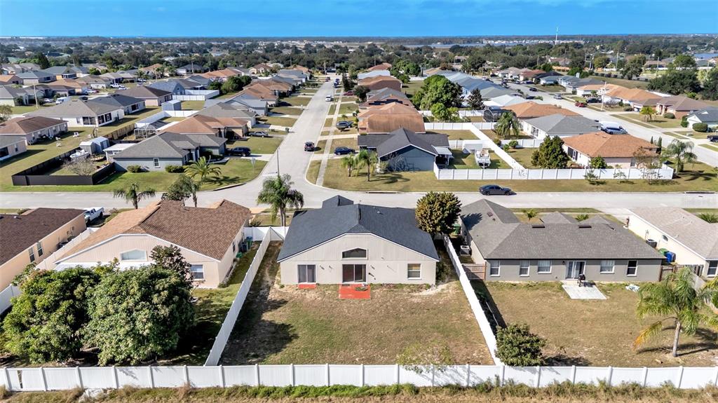 587 Drayton Road Winter Haven, FL 33884 - Photo 40 of 40 an aerial view of a house with a yard