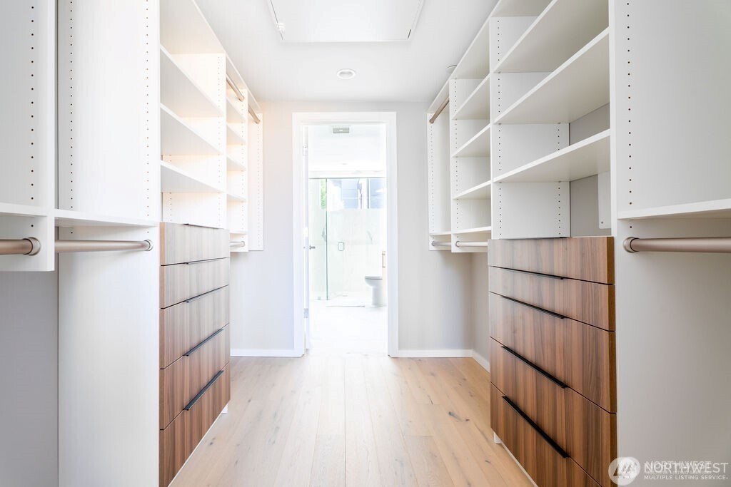 1709 20th Avenue, Unit A Seattle, WA 98122 - Photo 13 of 20 a view of walk in closet with empty racks