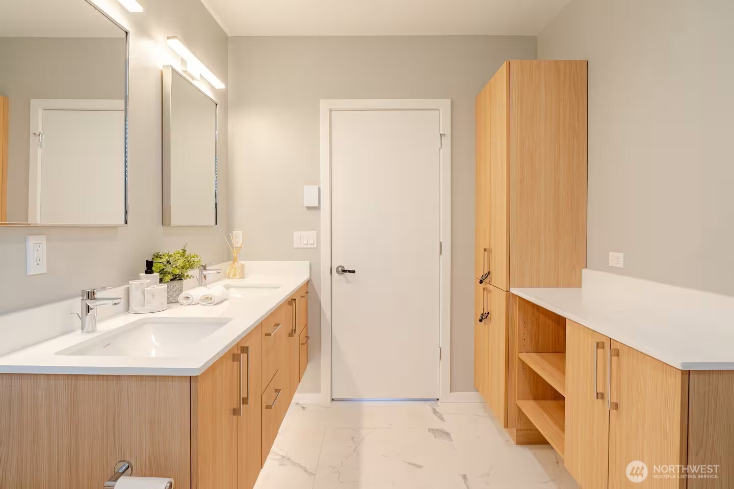 1709 20th Avenue, Unit A Seattle, WA 98122 - Photo 14 of 20 a bathroom with a double vanity sink and a mirror