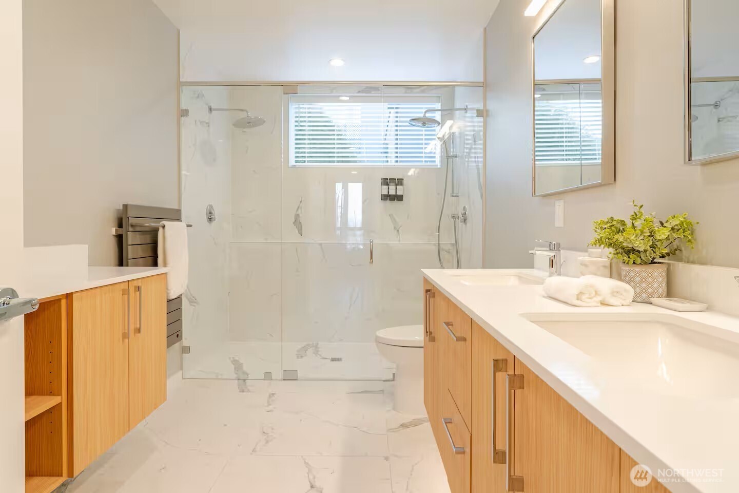 1709 20th Avenue, Unit A Seattle, WA 98122 - Photo 15 of 20 a bathroom with a sink a toilet and shower