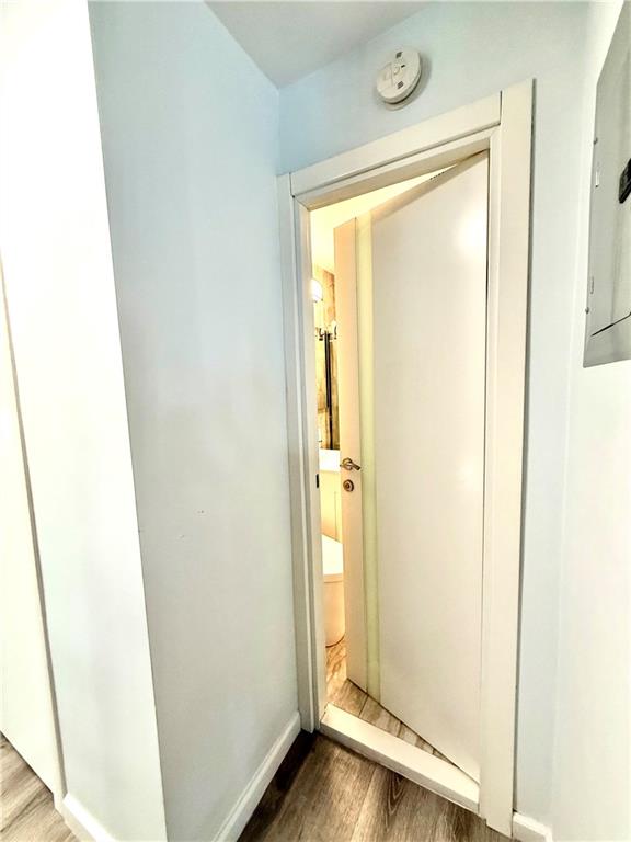 501 Surf Avenue, Unit 23M Brooklyn, NY 11224 - Photo 15 of 24 a view of front door with wooden floor