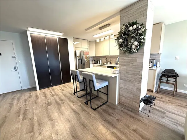 a view of a workspace with furniture and a livingroom