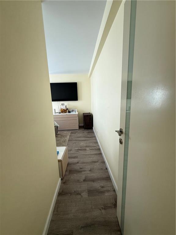 501 Surf Avenue, Unit 23M Brooklyn, NY 11224 - Photo 10 of 24 a living room with furniture and a flat screen tv