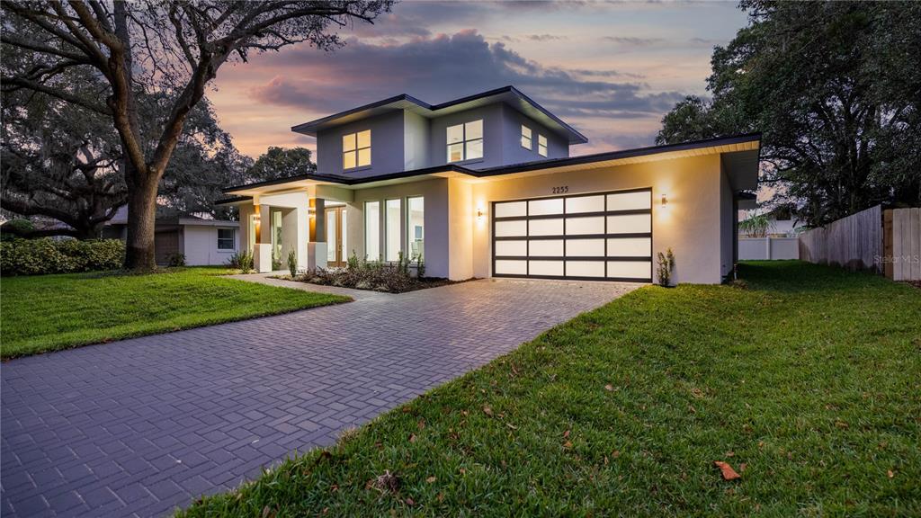 2255 Coldstream Drive Winter Park, FL 32792 - Photo 1 of 1 a front view of a house with a yard and garage