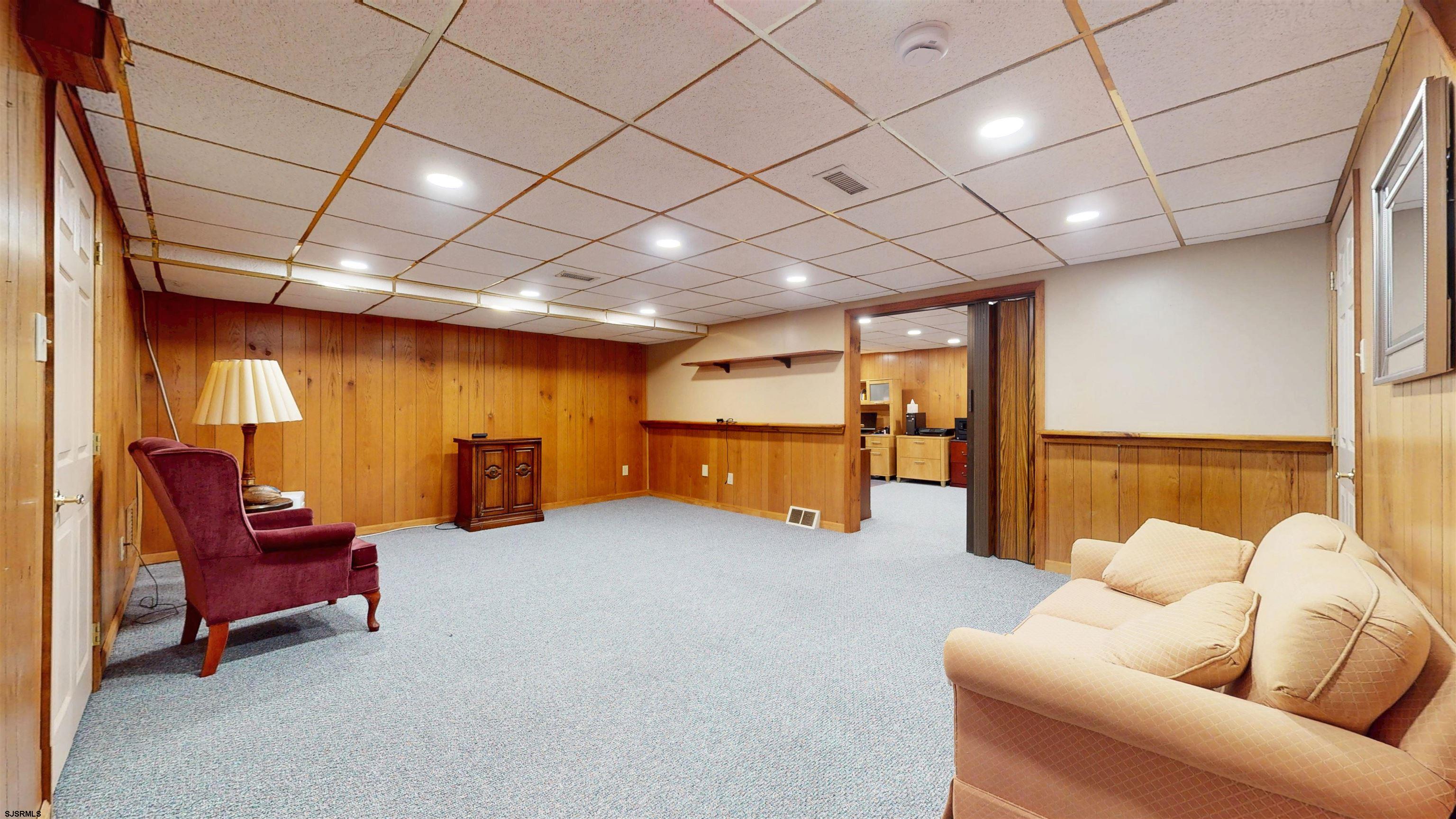46 Victoria Lane Ocean View, NJ 08230 - Photo 35 of 66 a living room with furniture and a table