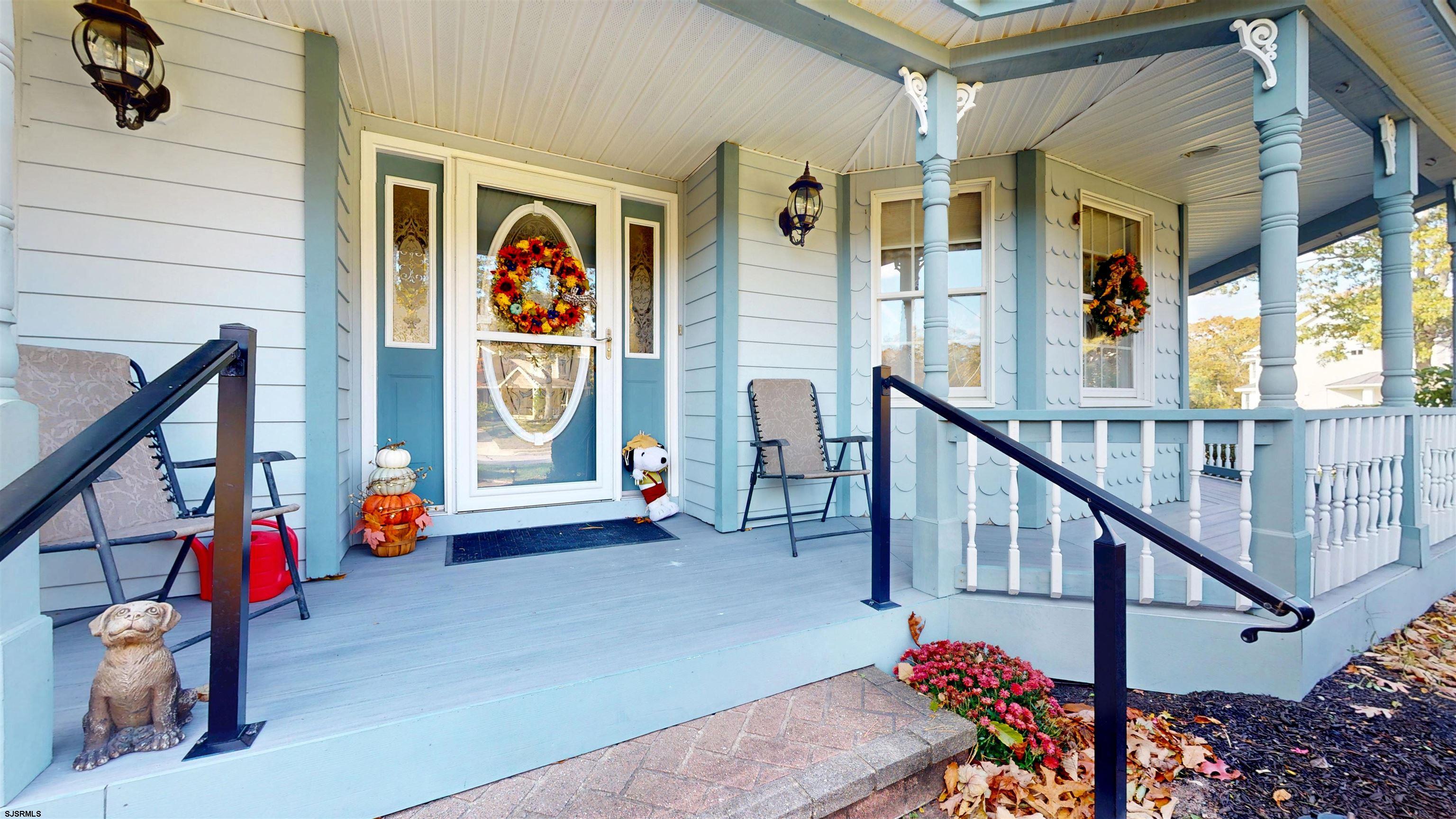 46 Victoria Lane Ocean View, NJ 08230 - Photo 43 of 66 a view of an entryway with wooden floor and stairs
