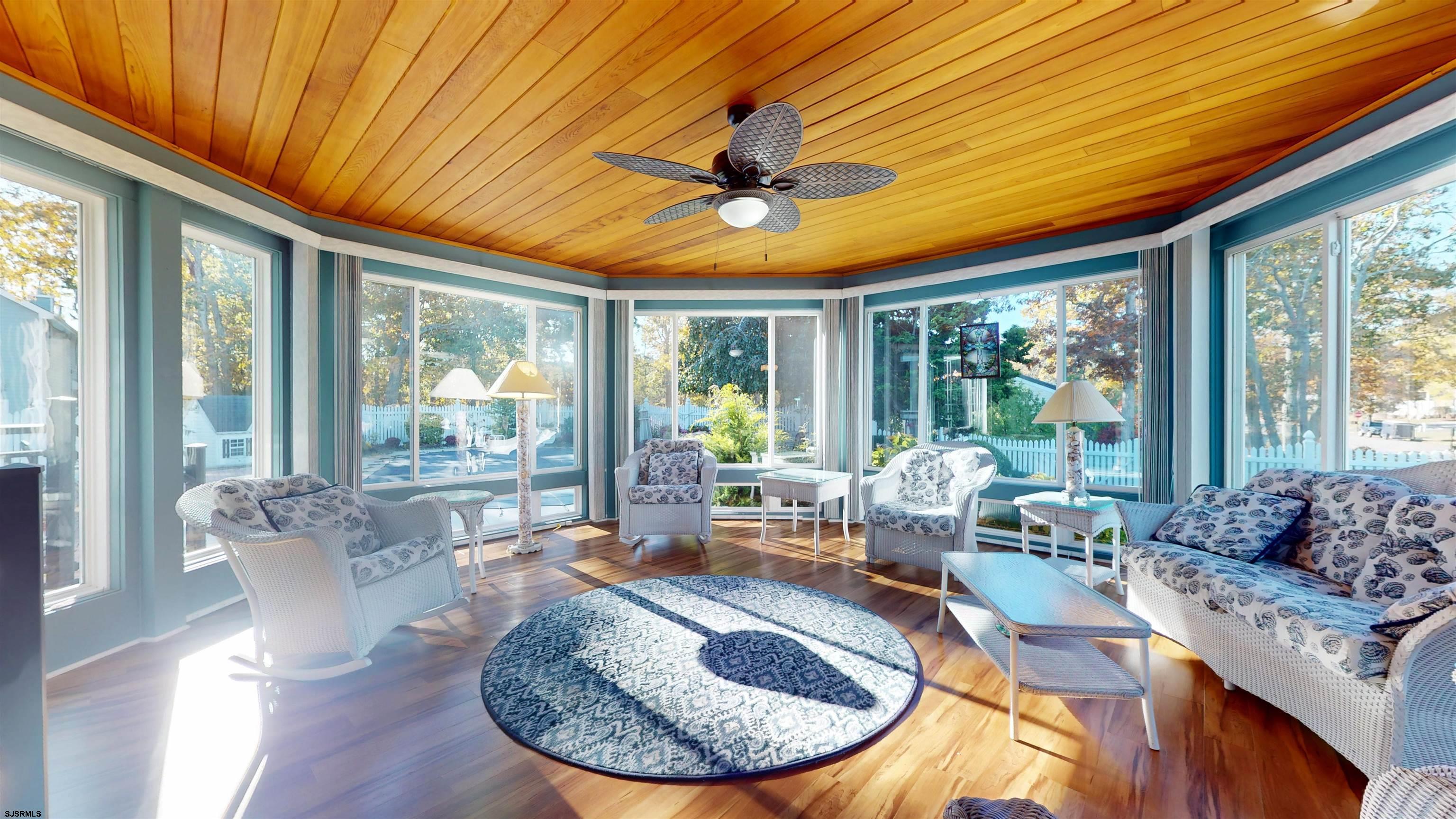 46 Victoria Lane Ocean View, NJ 08230 - Photo 46 of 66 a living room with furniture and a large window