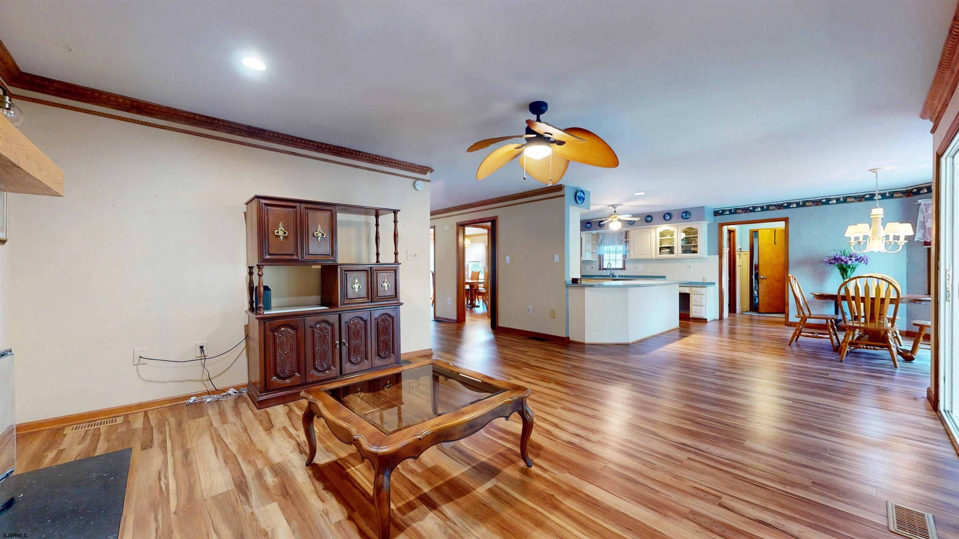 46 Victoria Lane Ocean View, NJ 08230 - Photo 7 of 66 a living room with furniture and wooden floor