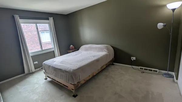 a bed room with a bed
