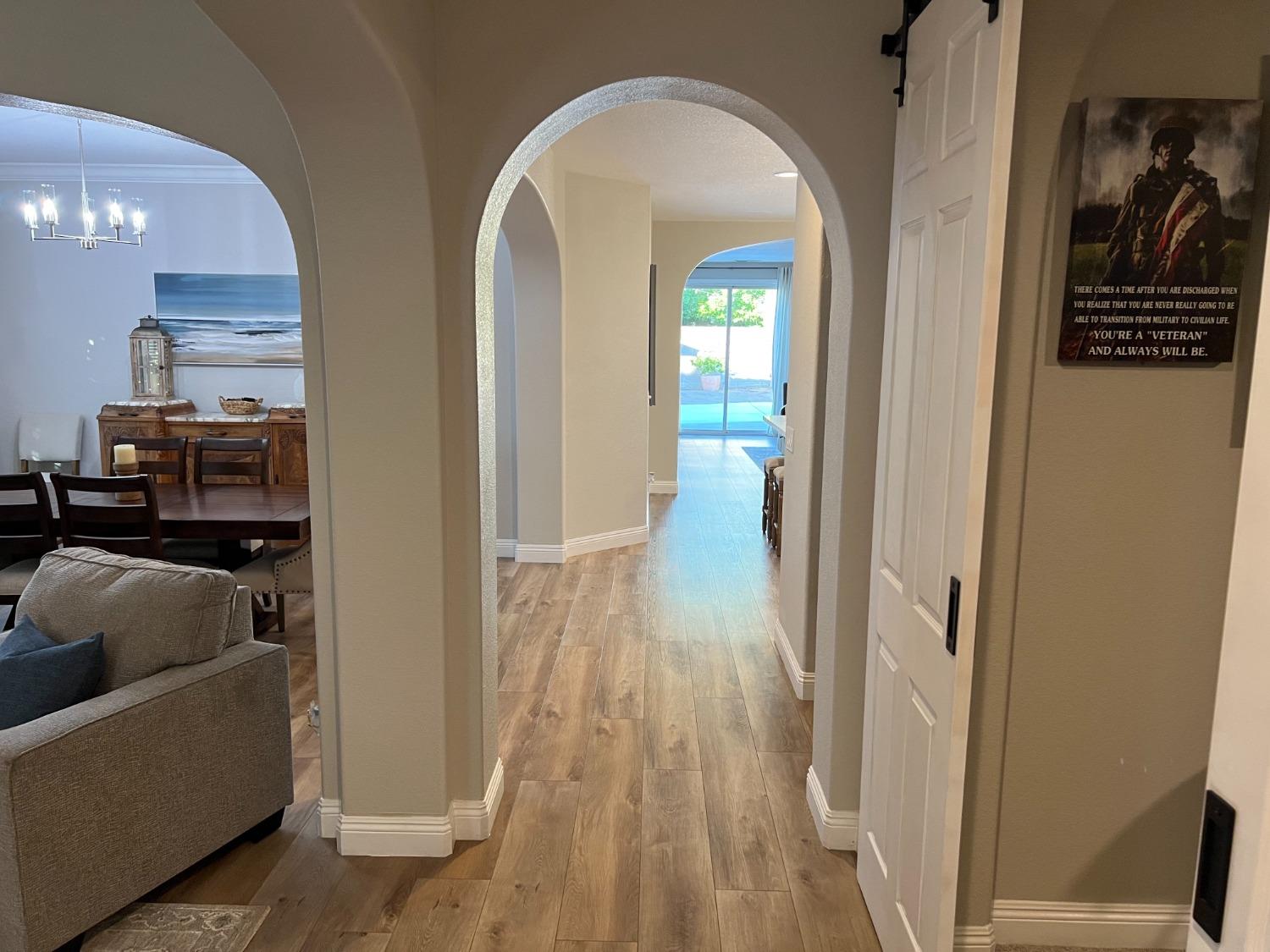 1135 North Perry Avenue Clovis, CA 93611 - Photo 12 of 27 a view of livingroom with furniture and wooden floor
