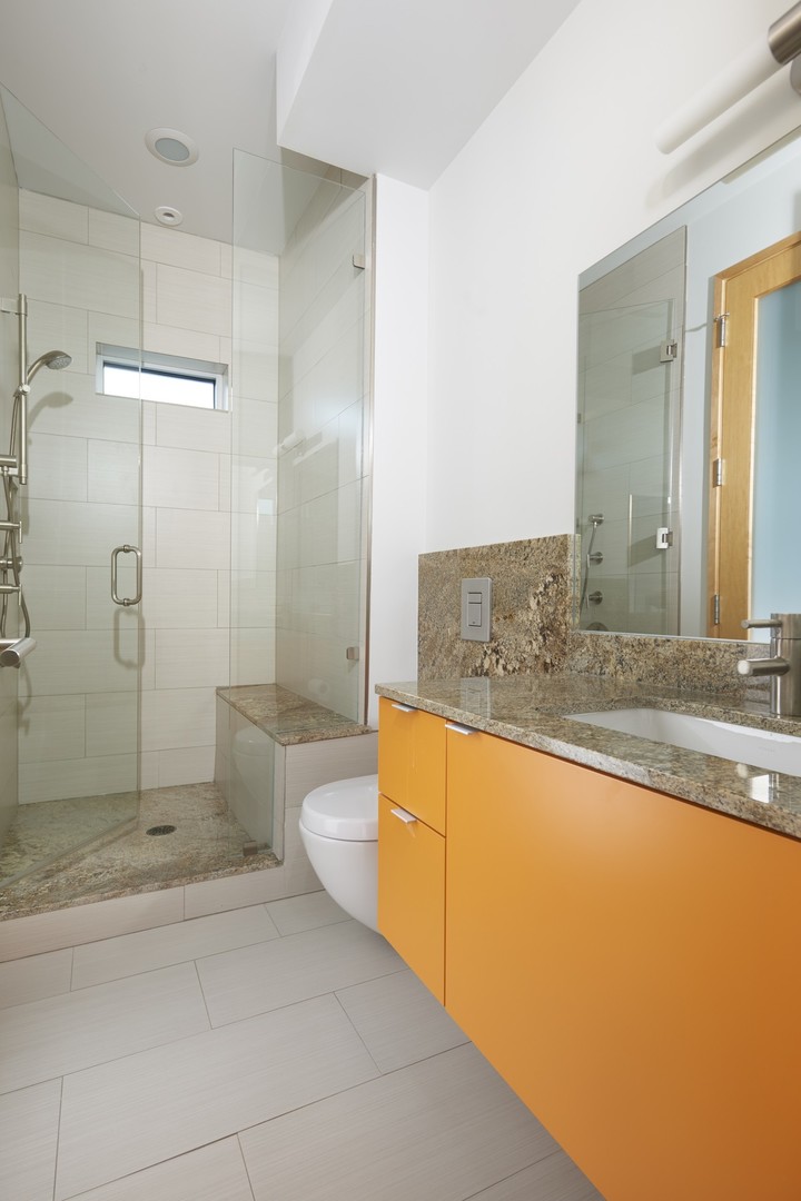 Undisclosed Address Chicago, IL 60622 - Photo 20 of 33 a bathroom with a granite countertop sink mirror bathtub and toilet