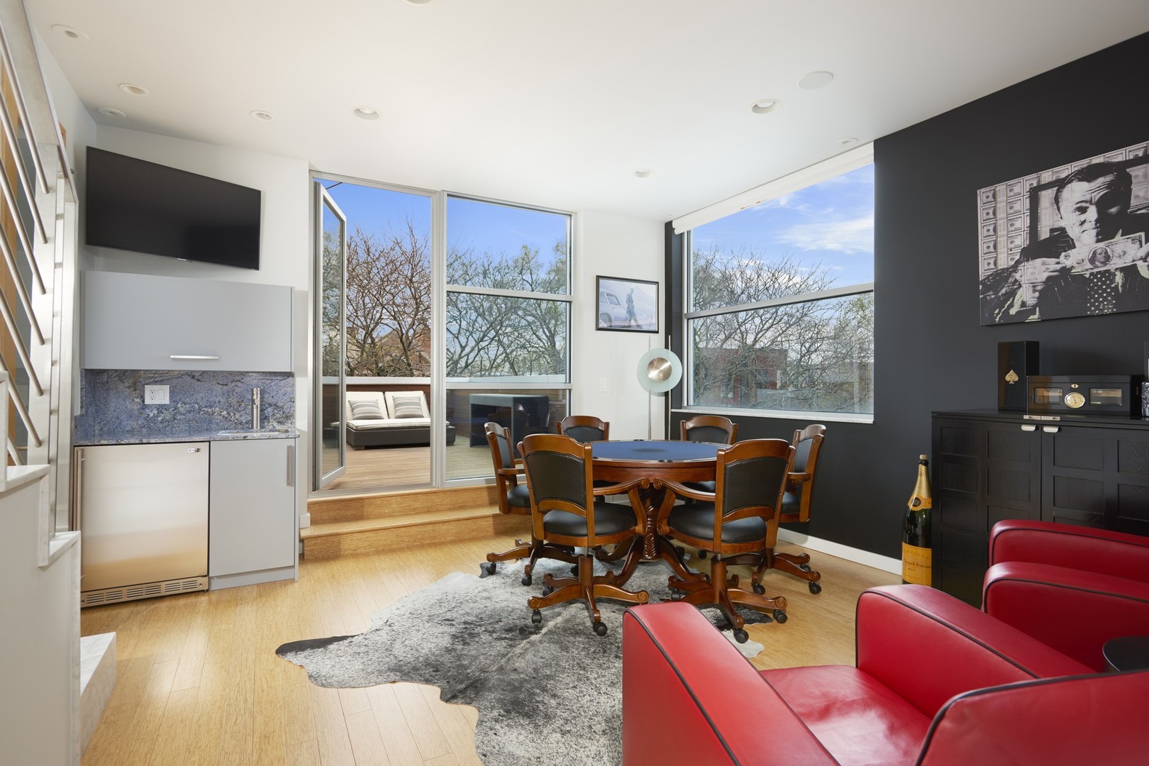 Undisclosed Address Chicago, IL 60622 - Photo 21 of 33 a living room with furniture and a flat screen tv