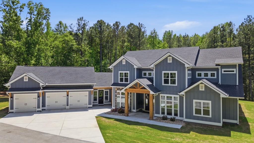 1416 Mt Bethel Road McDonough, GA 30252 - Photo 1 of 67 a front view of a house with yard swimming pool and outdoor seating