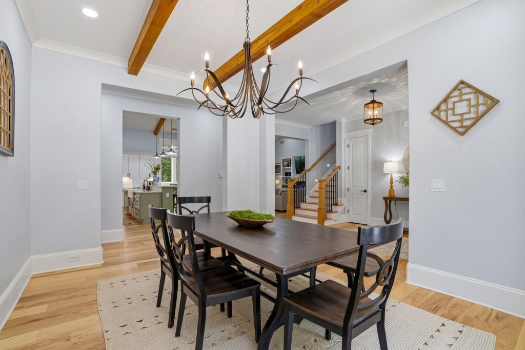 1416 Mt Bethel Road McDonough, GA 30252 - Photo 11 of 67 a view of a dining room with furniture and wooden floor