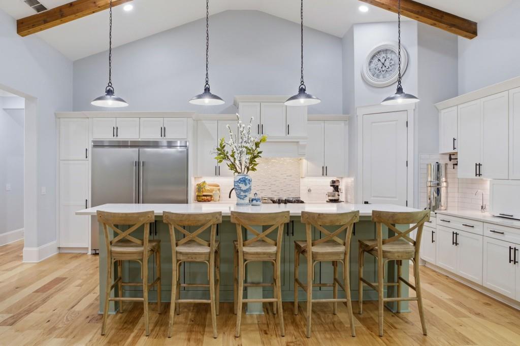 1416 Mt Bethel Road McDonough, GA 30252 - Photo 18 of 67 a kitchen with a table and chairs in it