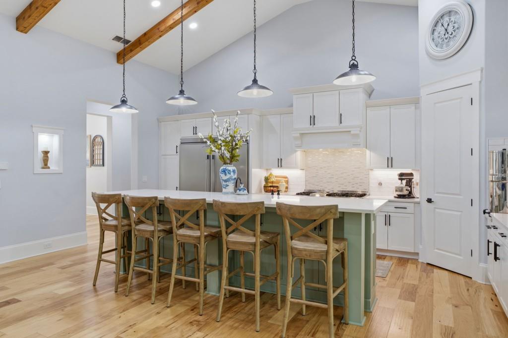 1416 Mt Bethel Road McDonough, GA 30252 - Photo 19 of 67 a kitchen with a table and chairs in it