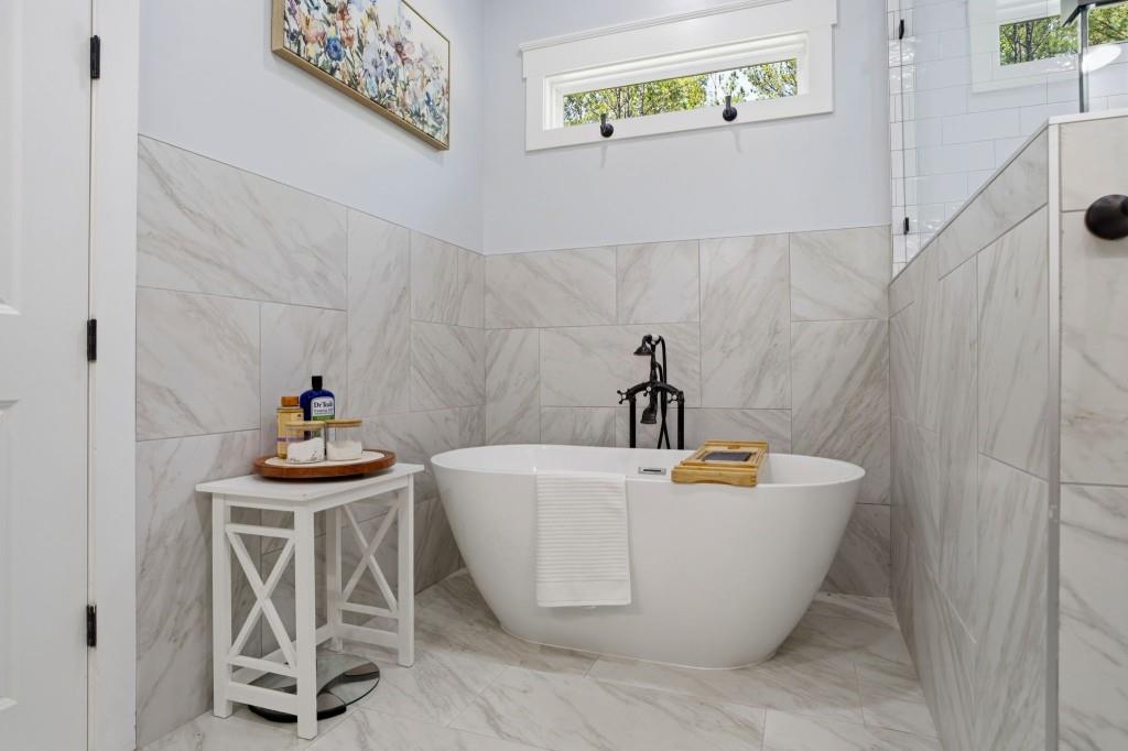 1416 Mt Bethel Road McDonough, GA 30252 - Photo 36 of 67 a view of a bathtub in a bathroom