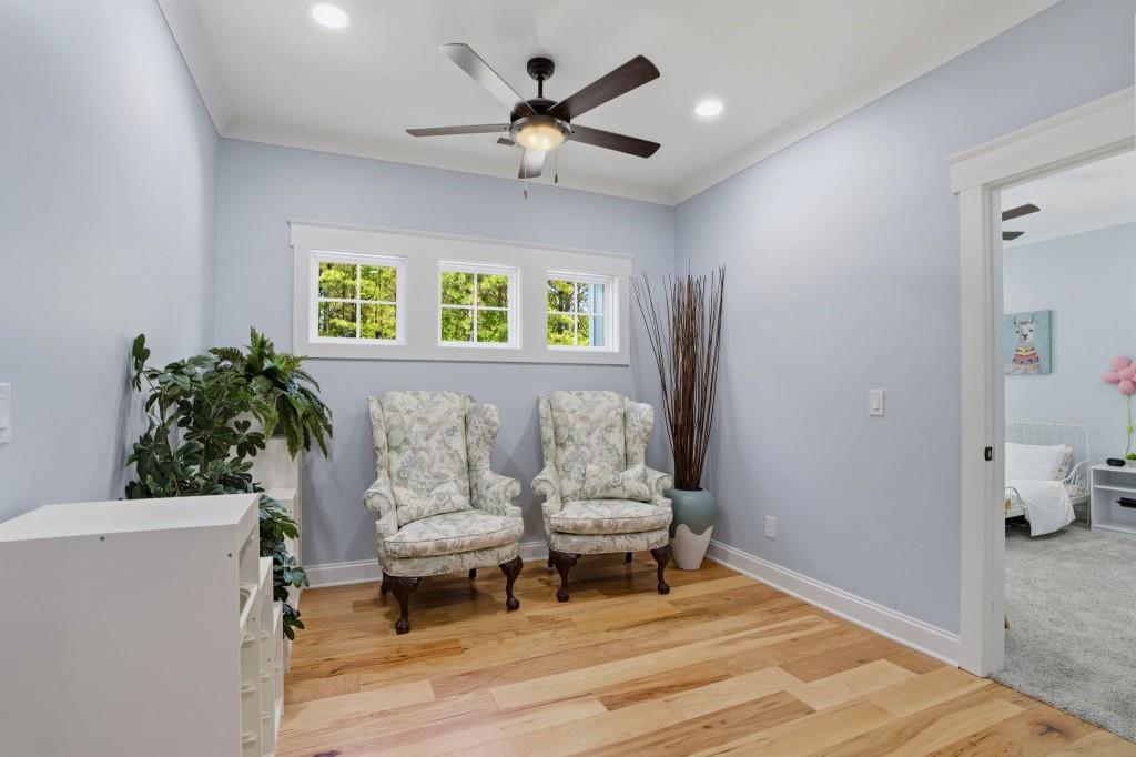 1416 Mt Bethel Road McDonough, GA 30252 - Photo 43 of 67 a living room with furniture and a large window
