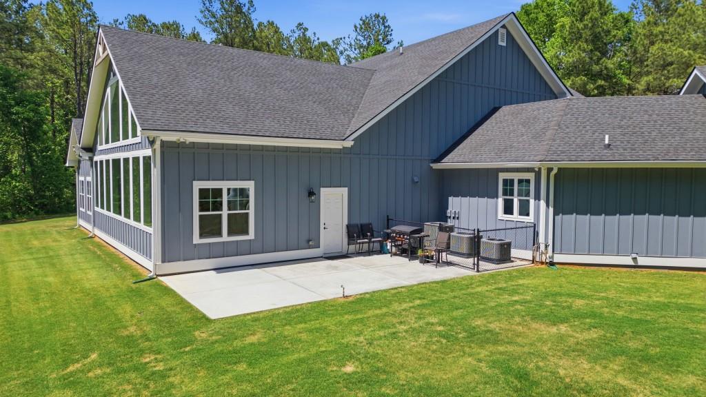 1416 Mt Bethel Road McDonough, GA 30252 - Photo 52 of 67 a view of a house with a yard and sitting area