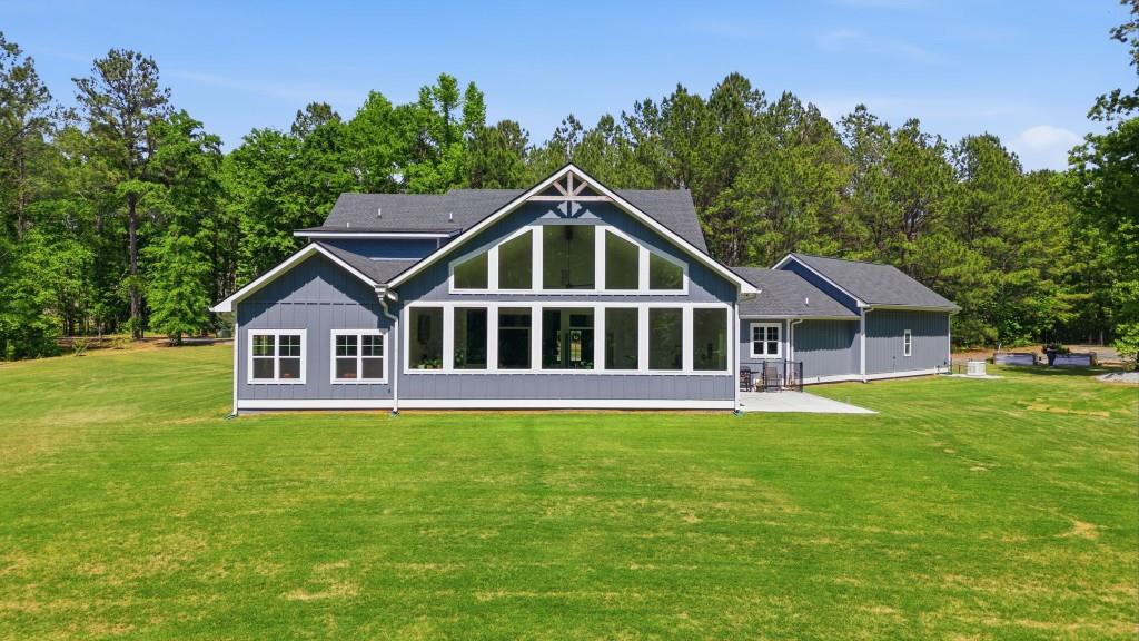 1416 Mt Bethel Road McDonough, GA 30252 - Photo 55 of 67 a front view of a house with a yard