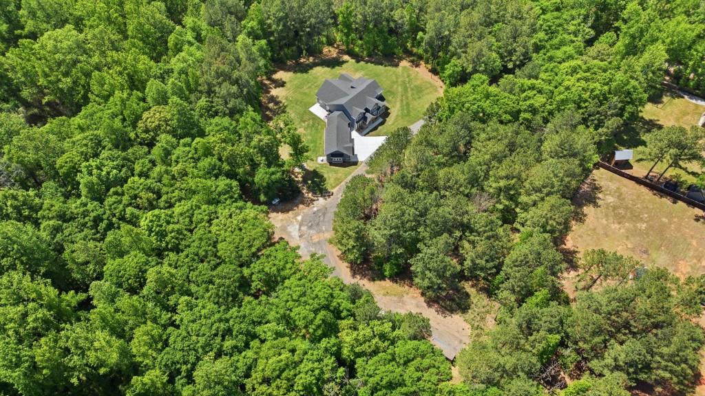 1416 Mt Bethel Road McDonough, GA 30252 - Photo 66 of 67 an aerial view of a house with a yard