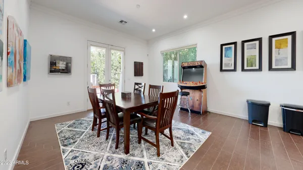 a view of a dining room with furniture