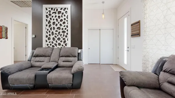 a living room with furniture and a couch