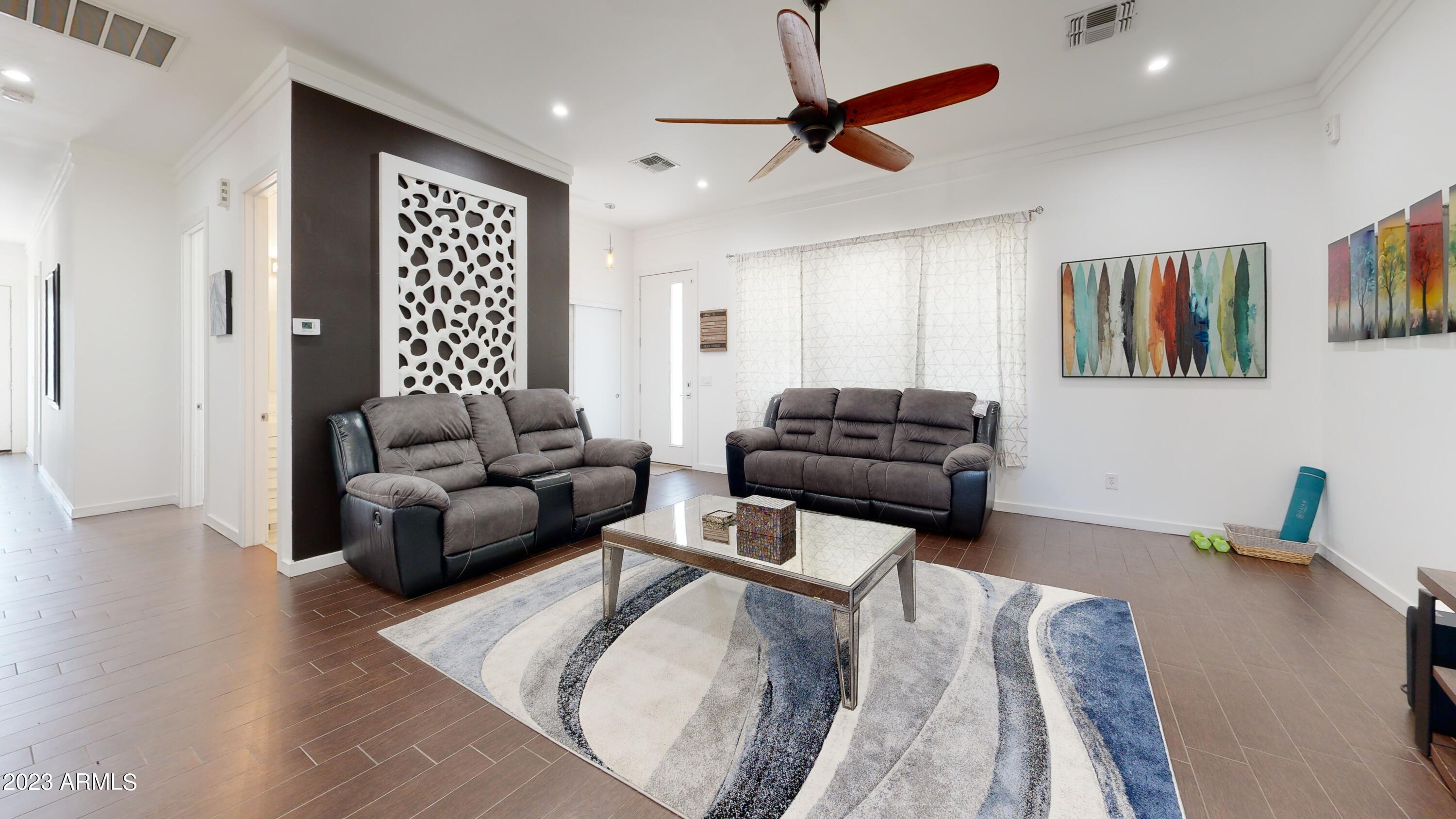 1202 East Colter Street Phoenix, AZ 85014 - Photo 17 of 30 a living room with furniture