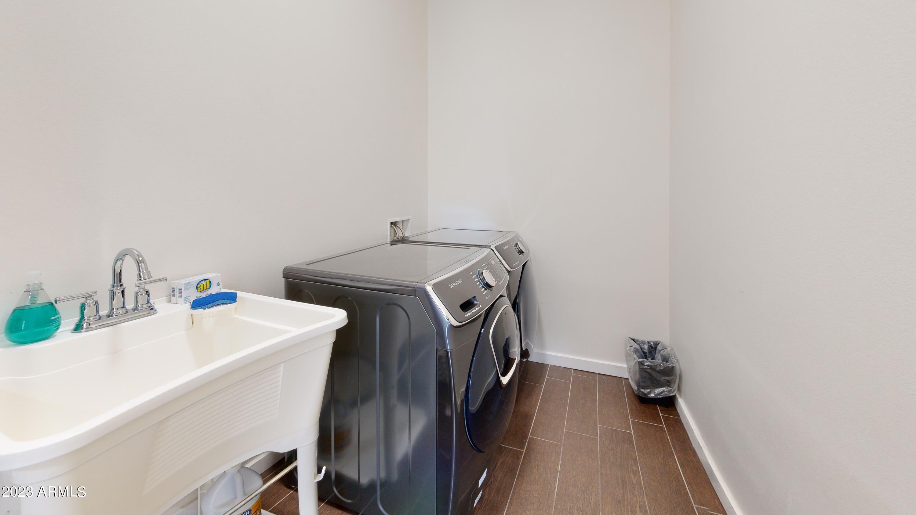 1202 East Colter Street Phoenix, AZ 85014 - Photo 29 of 30 a utility room with dryer and washer