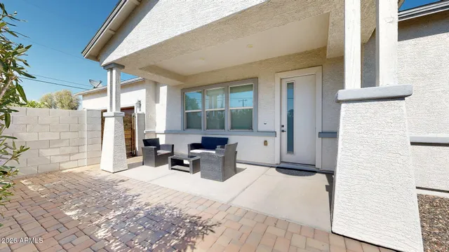 a bedroom with furniture and a window