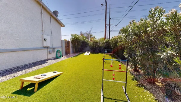 a view of a swimming pool with a backyard