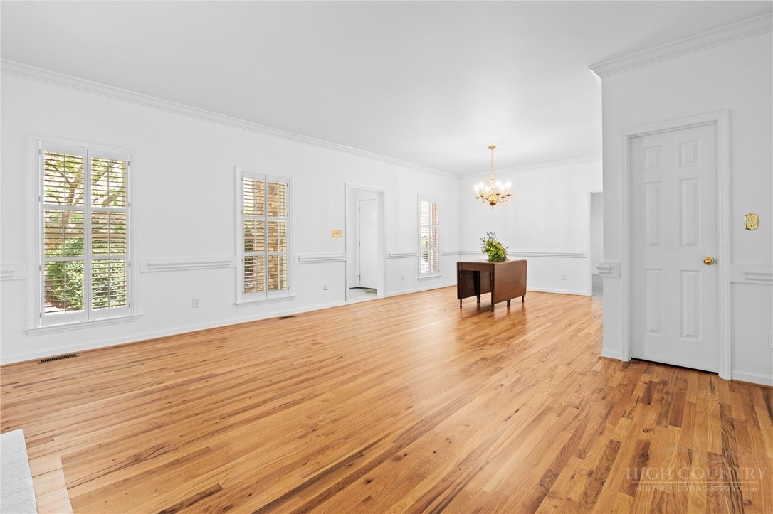 480 North Ridge Circle Boone, NC 28607 - Photo 6 of 50 a view of empty room with wooden floor