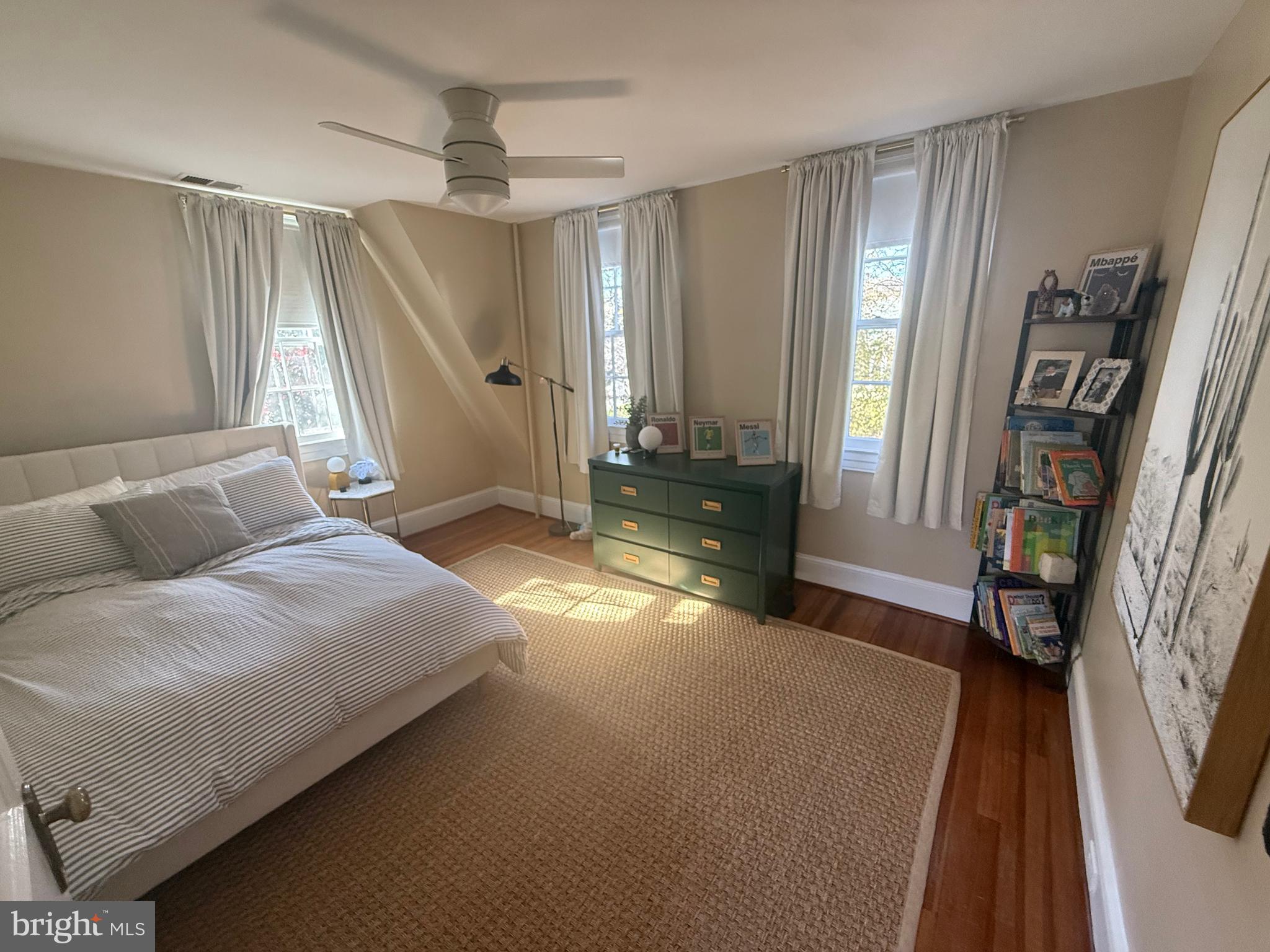 7113 Bristol Road Baltimore, MD 21212 - Photo 22 of 31 a bedroom with a bed window and a couch