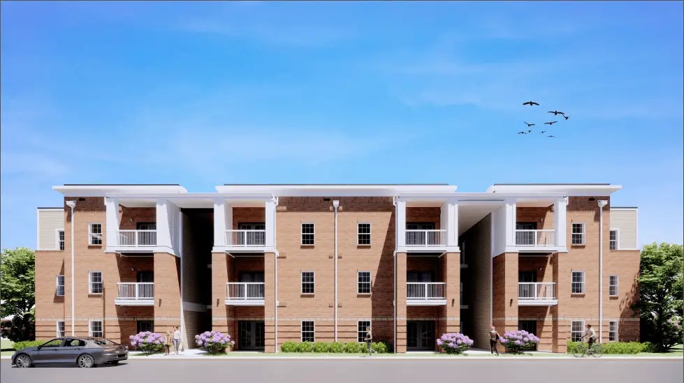 2701 Drewry's Bluff Road Richmond, VA 23237 - Photo 1 of 9 a front view of a building with lot of cars and trees